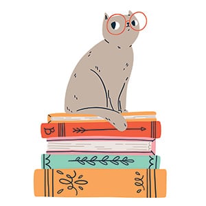 Cat in glasses sitting on a stack of books